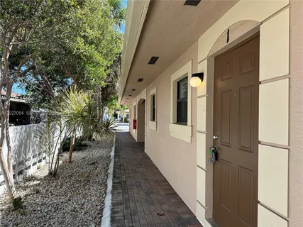 a view of a porch with furniture