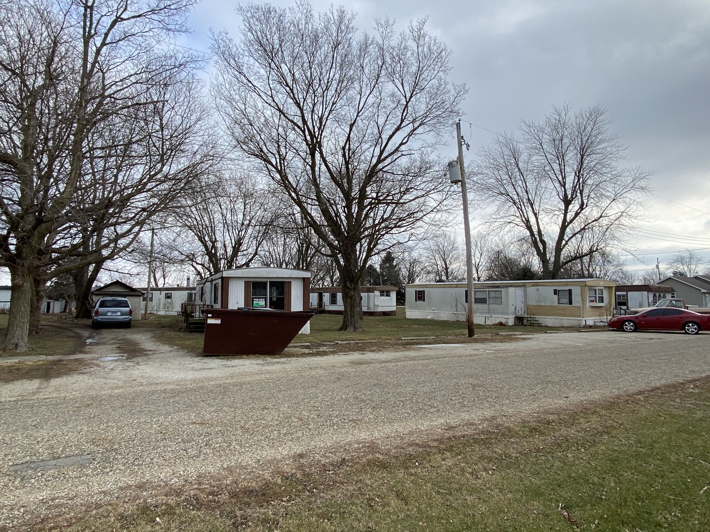 224 Poplar Street Ludlow, IL 60949 - Photo 2 of 9 a view of a house with a yard covered in snow