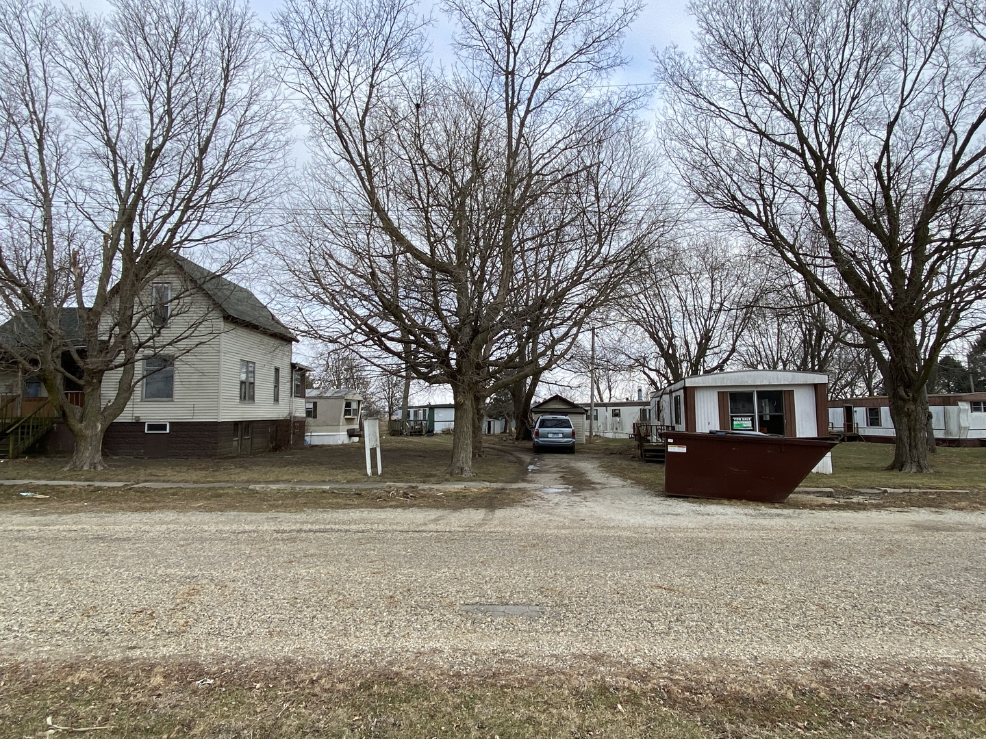 224 Poplar Street Ludlow, IL 60949 - Photo 3 of 9 a house that has a tree in front of it