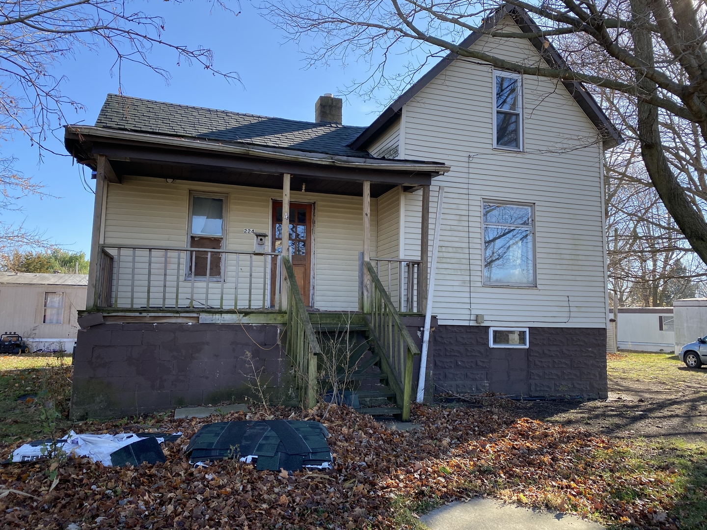 224 Poplar Street Ludlow, IL 60949 - Photo 5 of 9 a front view of a house with garden