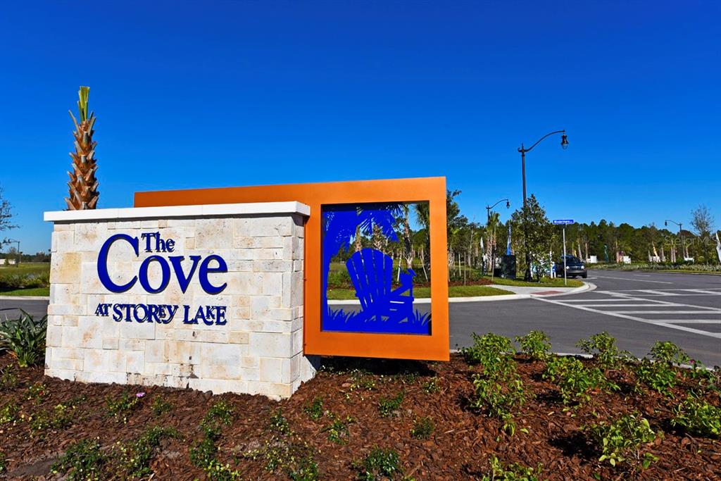 4794 Clock Tower Drive Kissimmee, FL 34746 - Photo 44 of 63 a sign board with a house and yard in the back