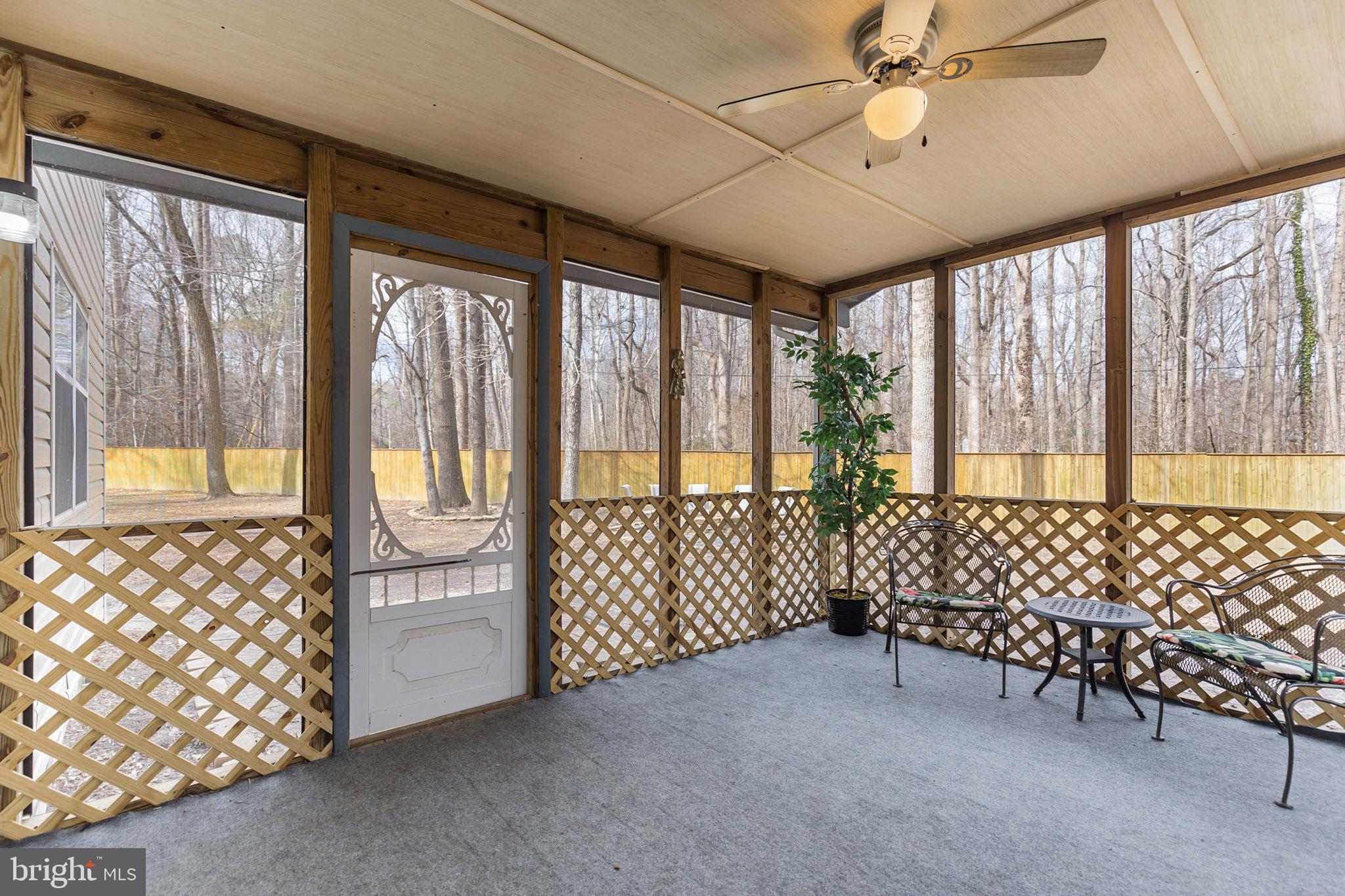6010 Hillside Road St. Leonard, MD 20685 - Photo 27 of 29 Screened in back porch