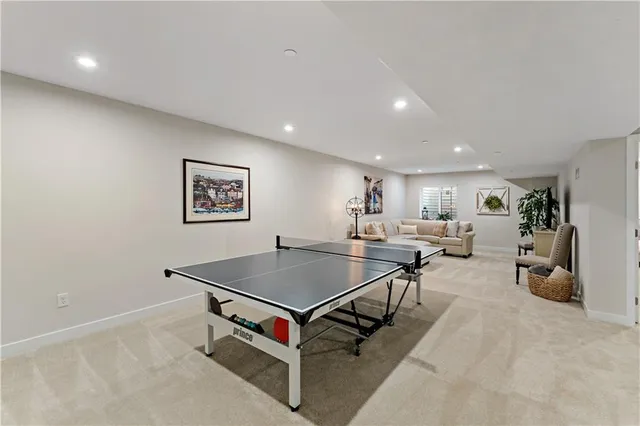a living room with furniture gym equipment and a view of living room