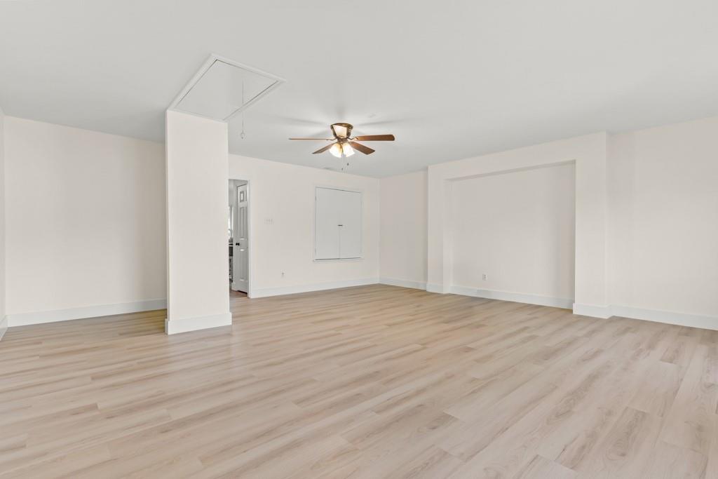 804 Alta Street Longview, TX 75604 - Photo 9 of 20 wooden floor in an empty room