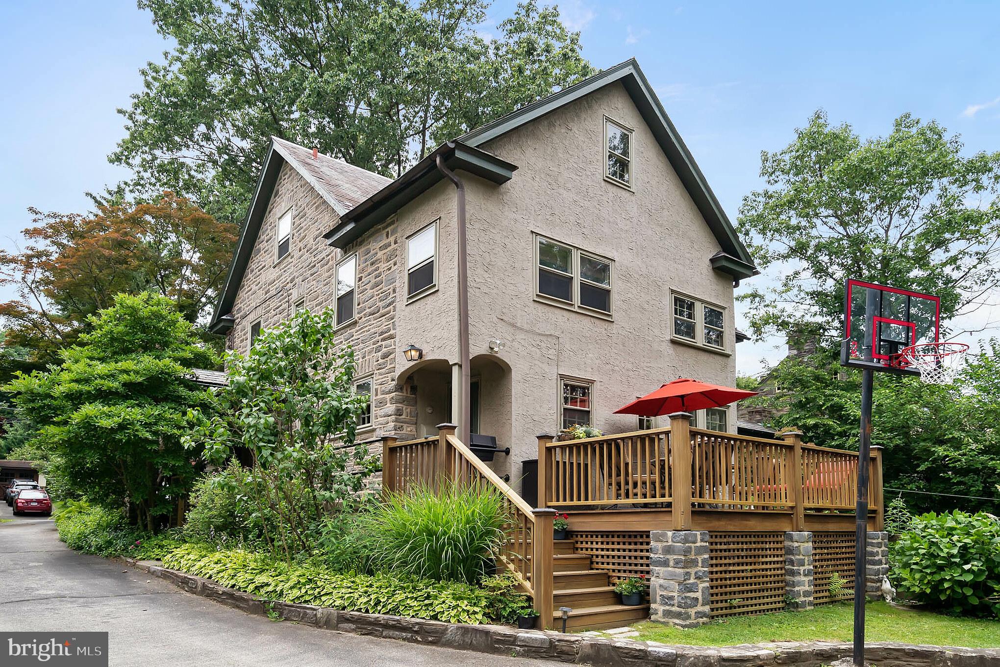 417 East Waverly Road Wyncote, PA 19095 - Photo 40 of 54 Side view of house with deck