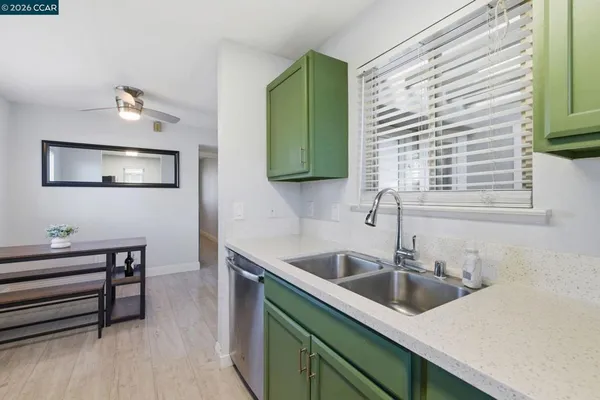 a kitchen with a stove and a microwave