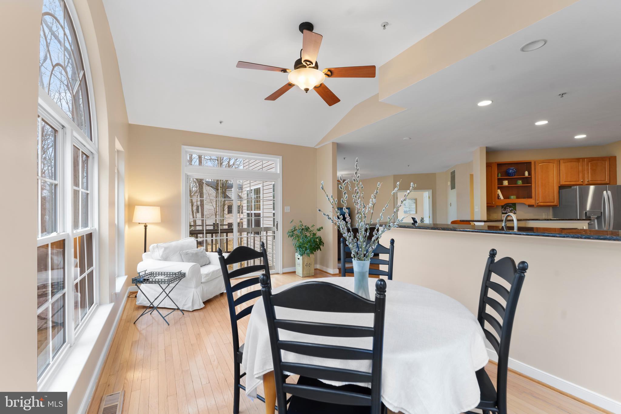 934 Zenith Drive Freeland, MD 21053 - Photo 19 of 50 a view of a dining room with furniture a chandelier and wooden floor