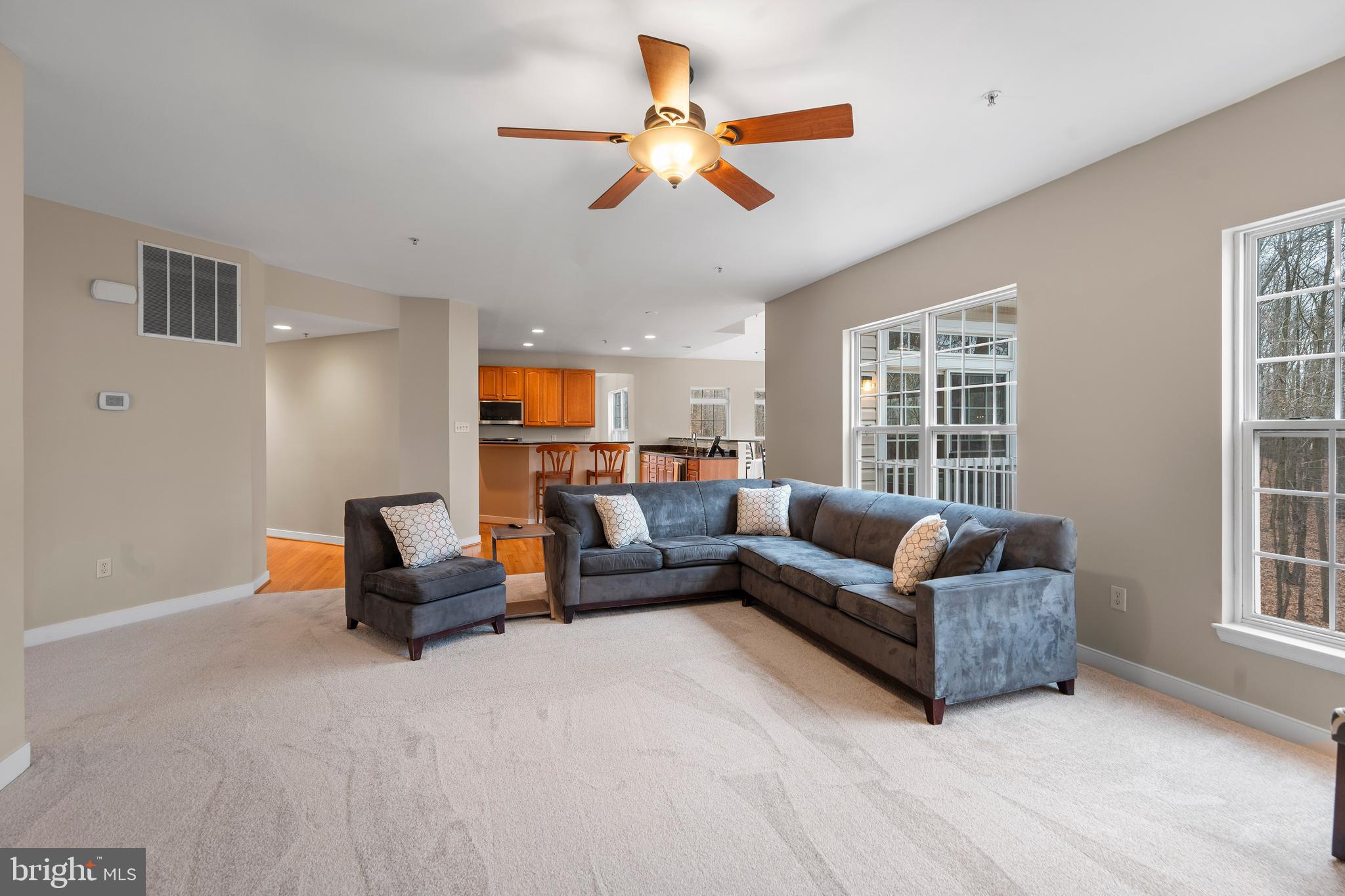 934 Zenith Drive Freeland, MD 21053 - Photo 22 of 50 a living room with furniture gym equipment and a large window