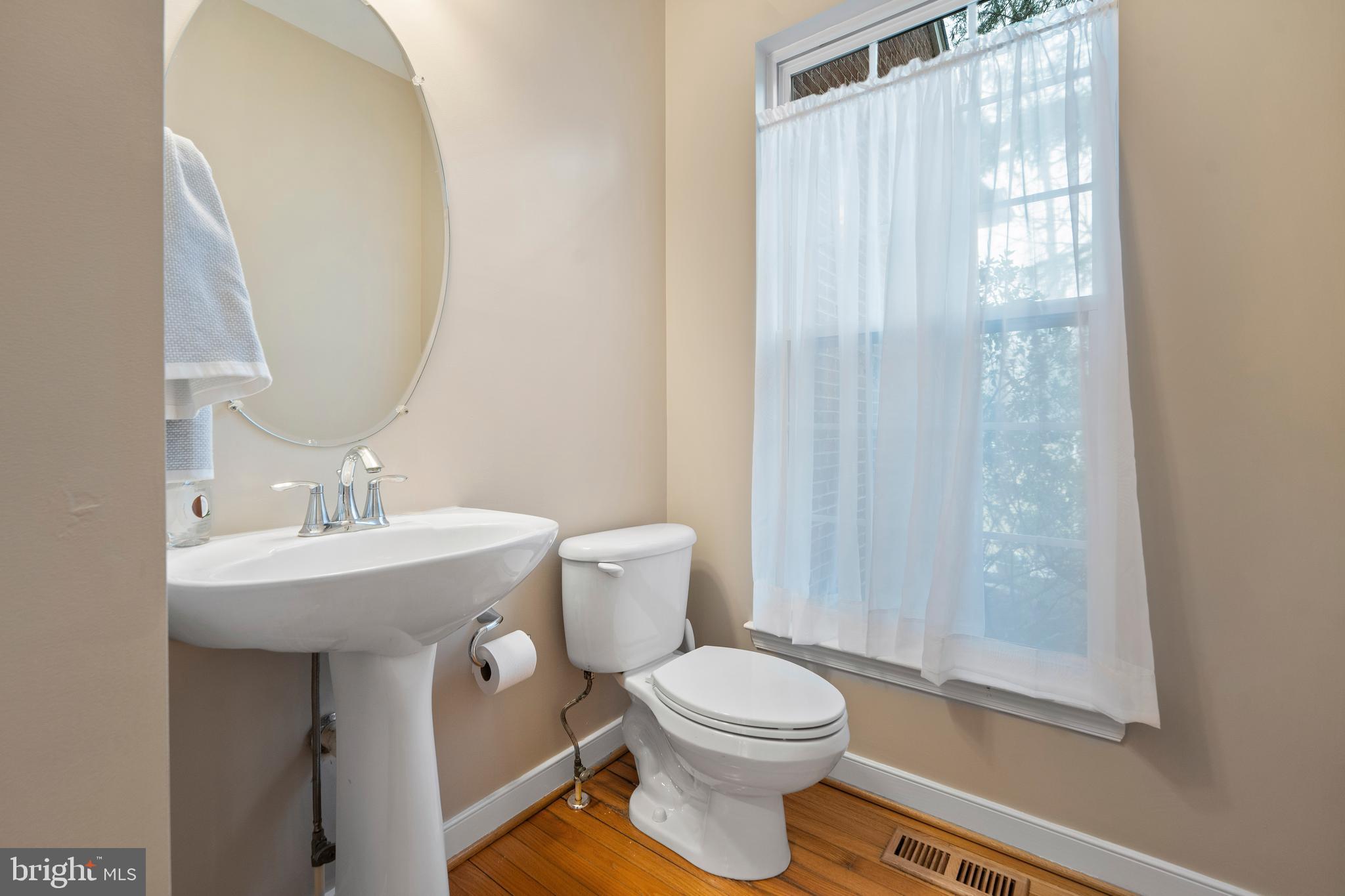 934 Zenith Drive Freeland, MD 21053 - Photo 25 of 50 a bathroom with a sink a toilet and shower