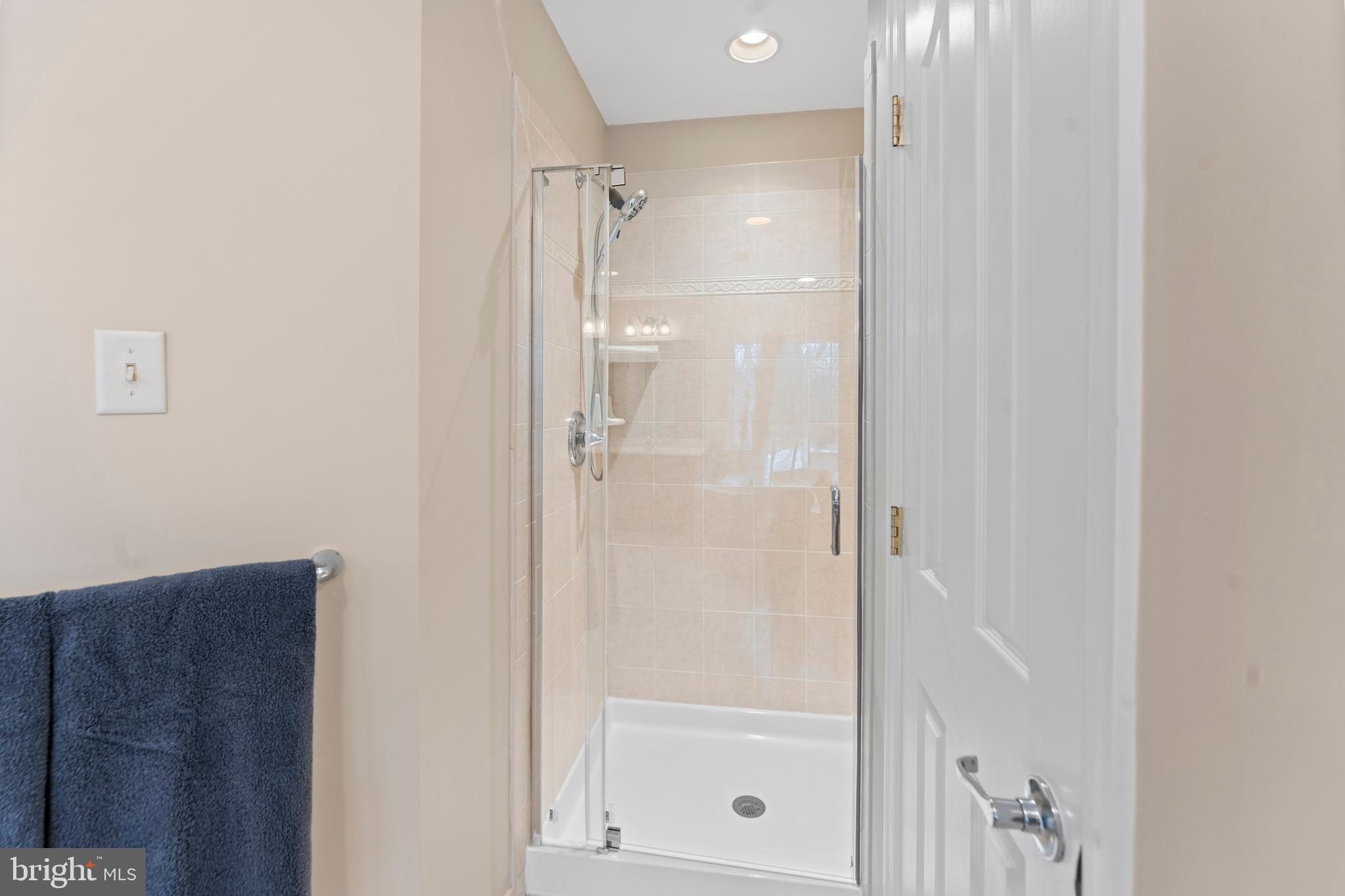 934 Zenith Drive Freeland, MD 21053 - Photo 36 of 50 a bathroom with a glass shower door