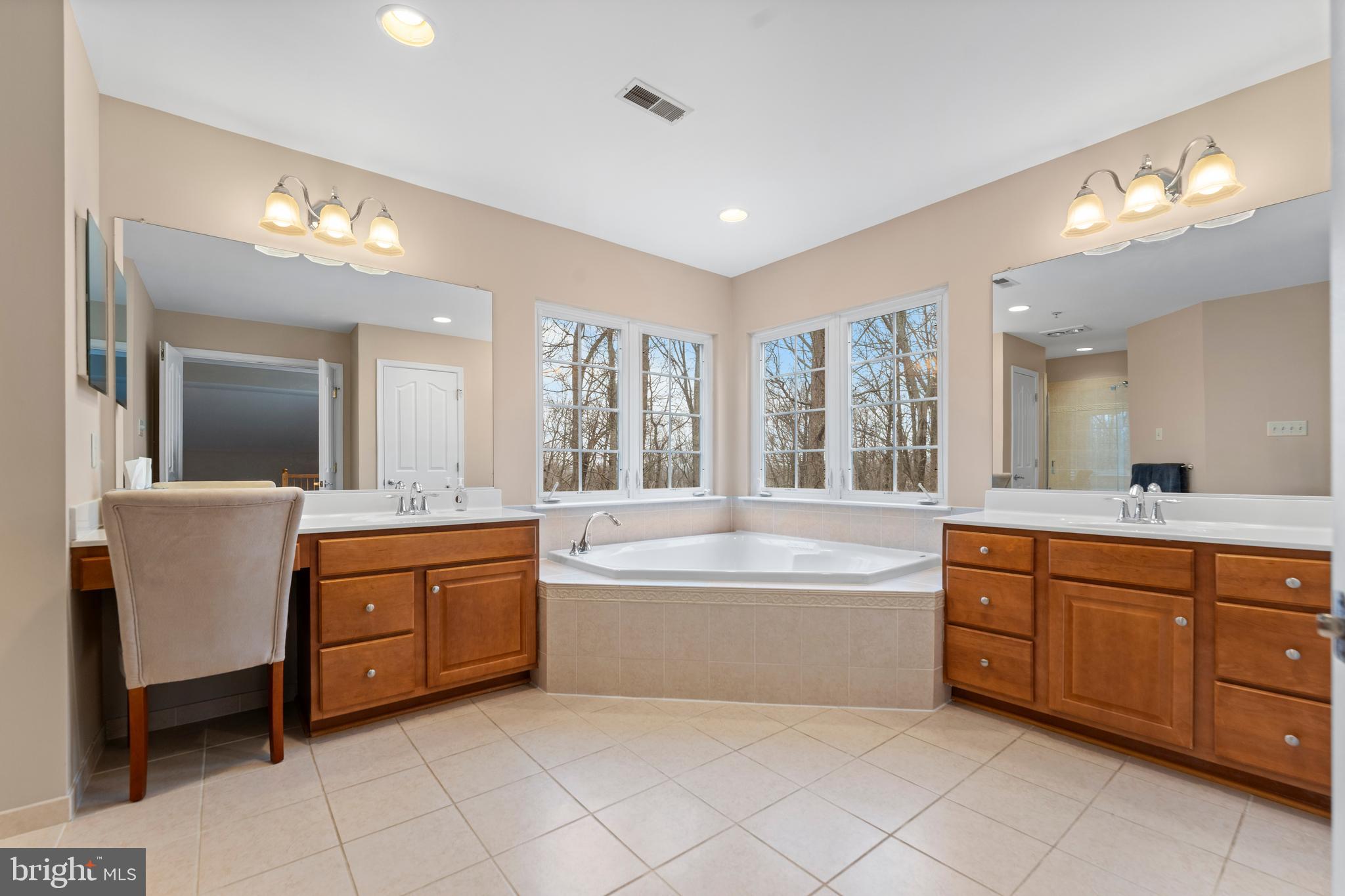 934 Zenith Drive Freeland, MD 21053 - Photo 37 of 50 a large spacious bathroom with a large tub sink and vanity