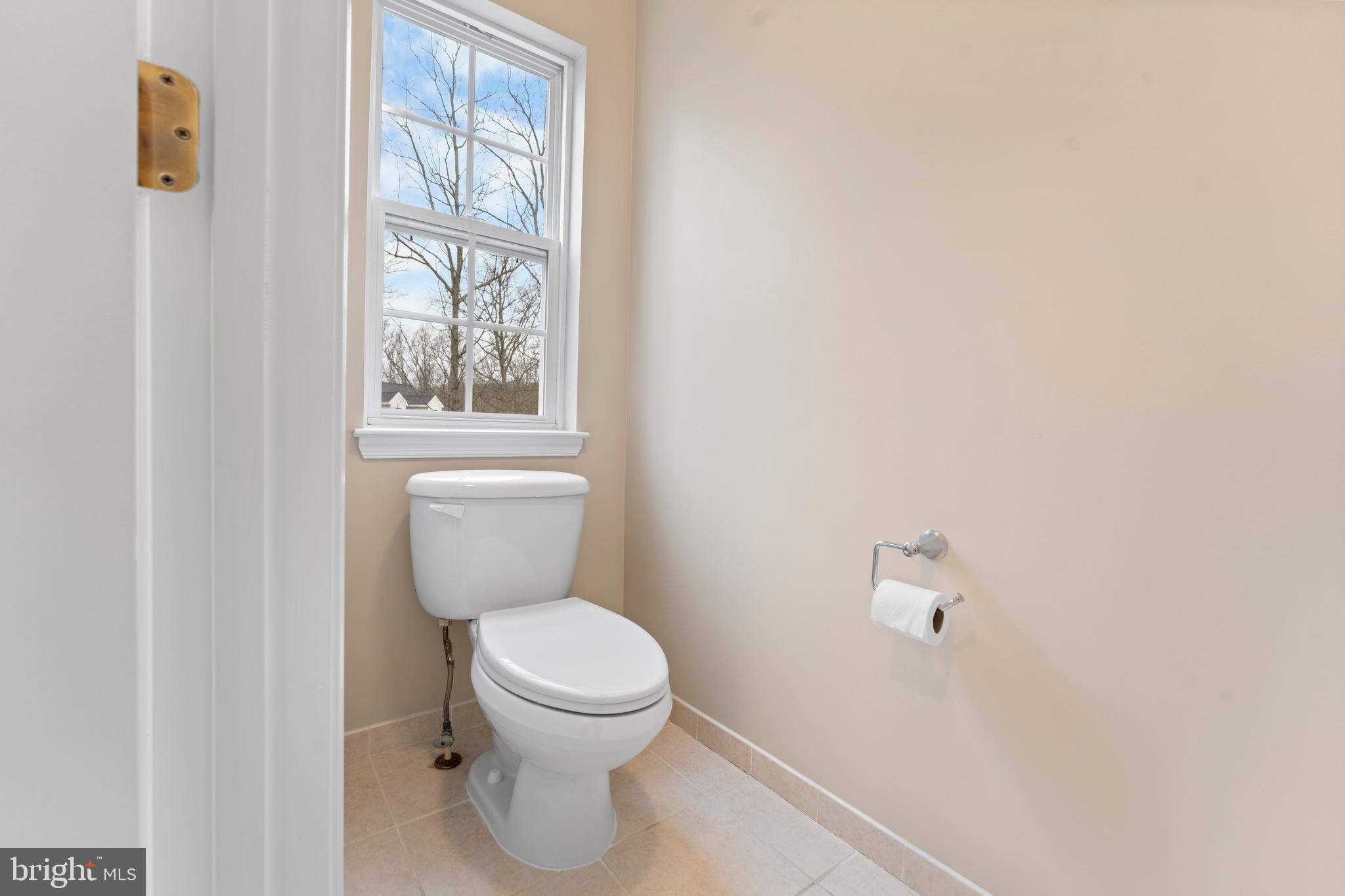 934 Zenith Drive Freeland, MD 21053 - Photo 38 of 50 a white toilet sitting next to a window