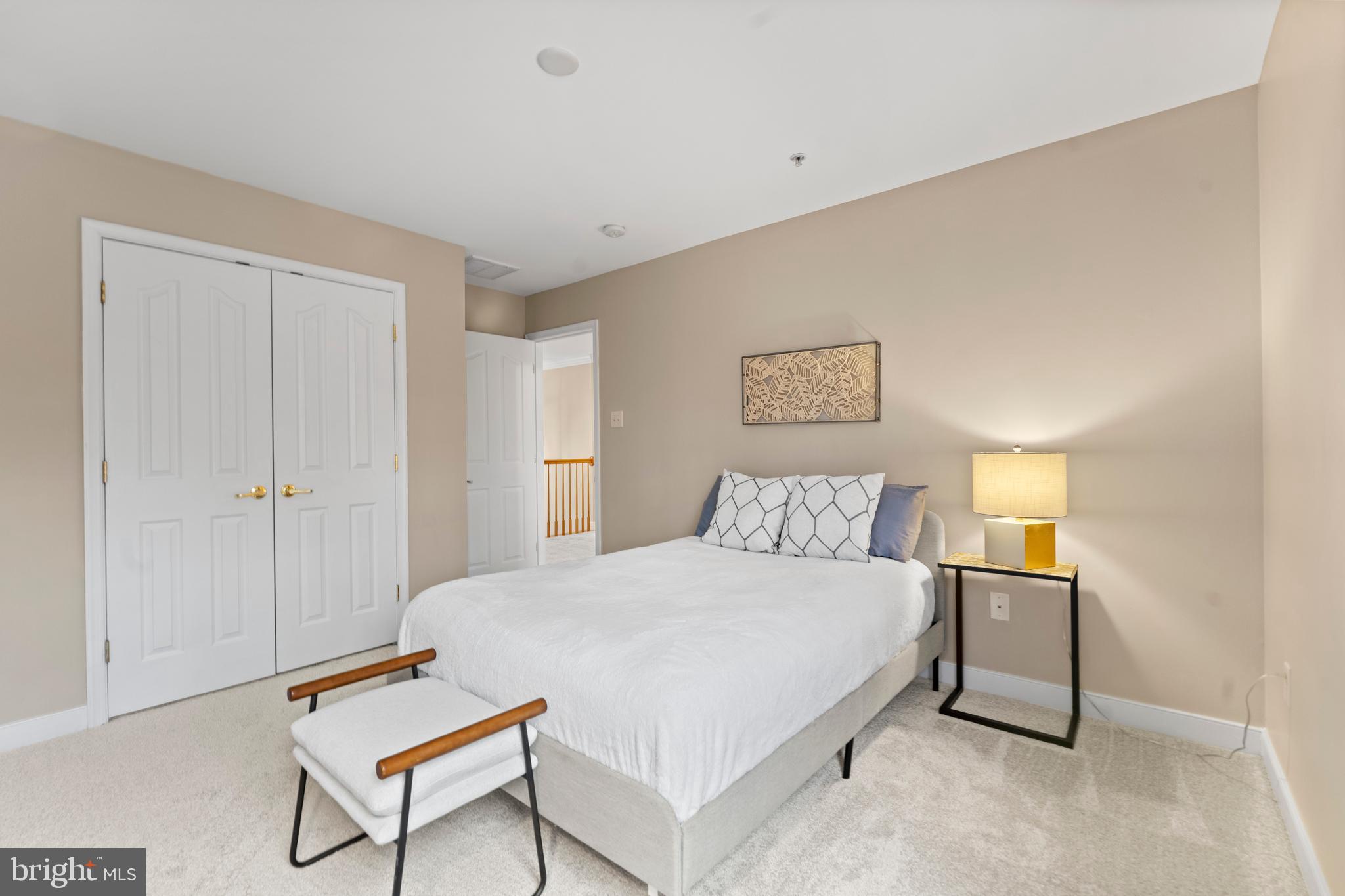 934 Zenith Drive Freeland, MD 21053 - Photo 40 of 50 a bedroom with a bed and a lamp