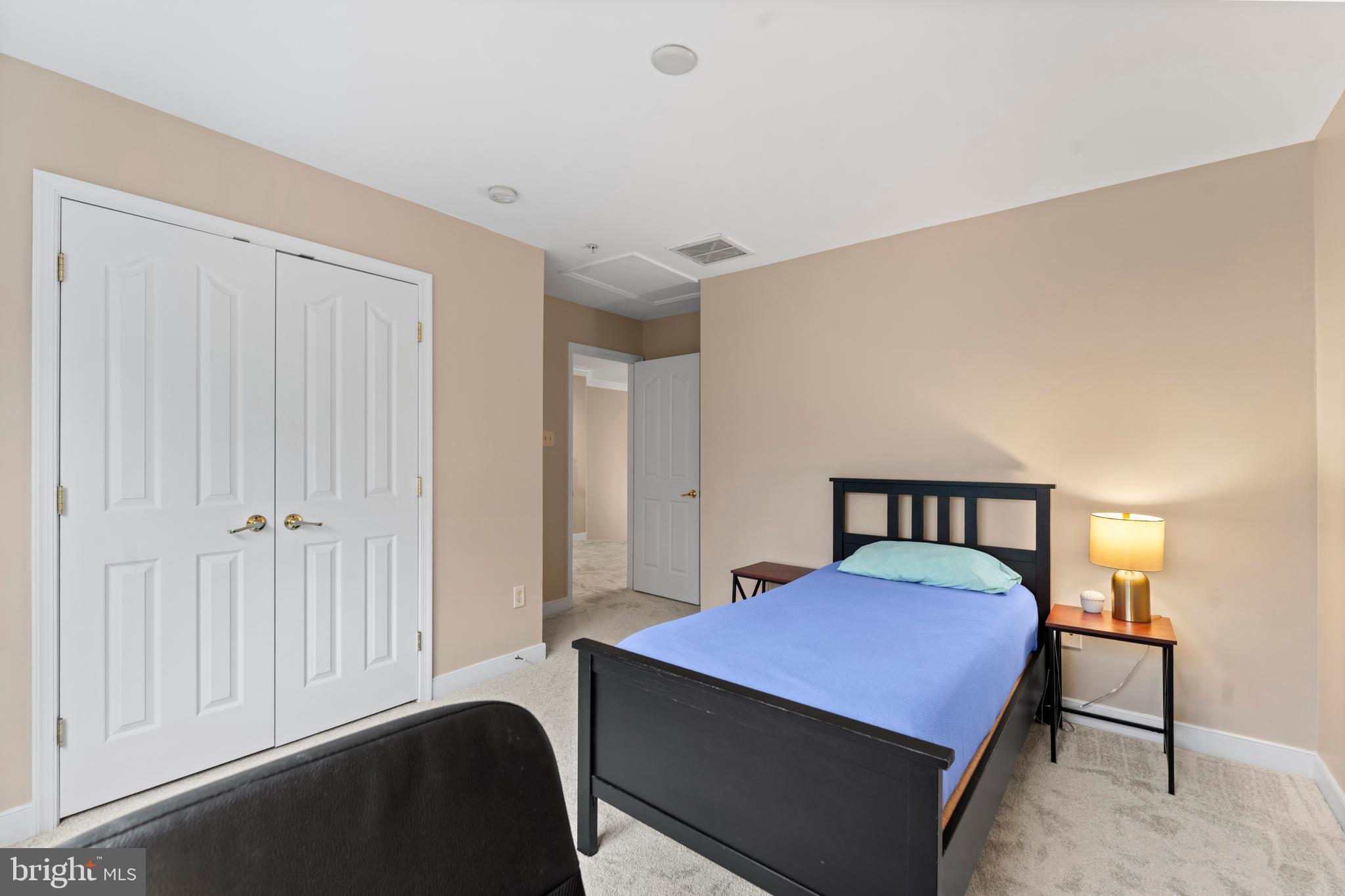 934 Zenith Drive Freeland, MD 21053 - Photo 42 of 50 a bedroom with a bed and a lamp on dresser