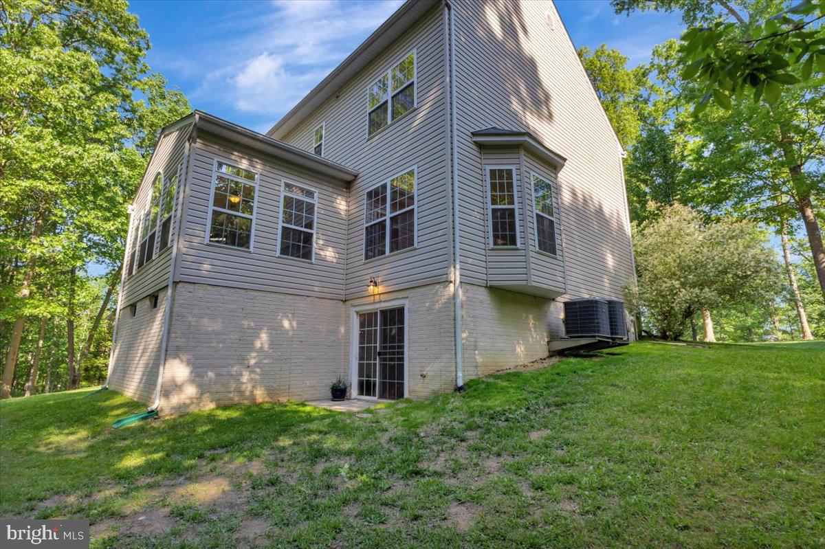 934 Zenith Drive Freeland, MD 21053 - Photo 48 of 50 a front view of a house with a garden