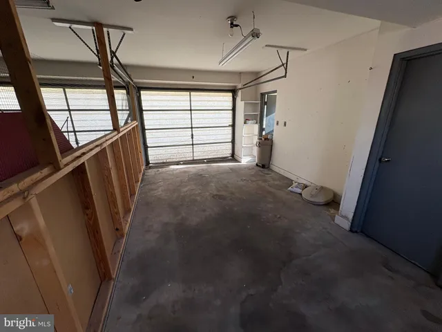 a view of empty room with windows