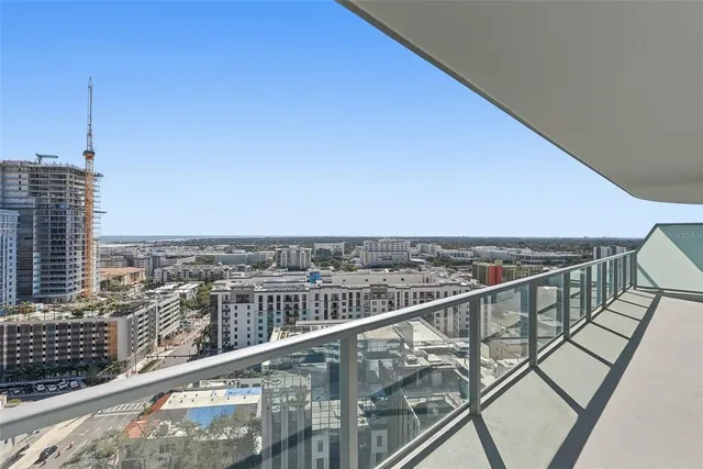 a view of a city with tall buildings