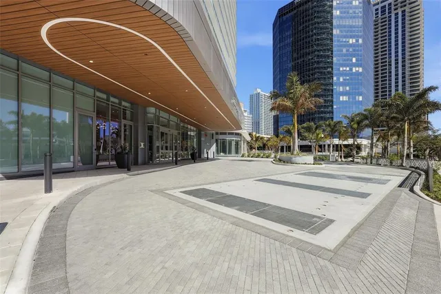 a view of a building with a park