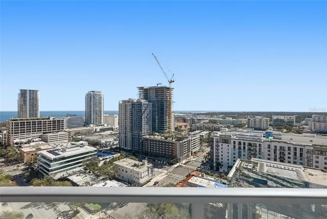 a view of swimming pool with outdoor seating