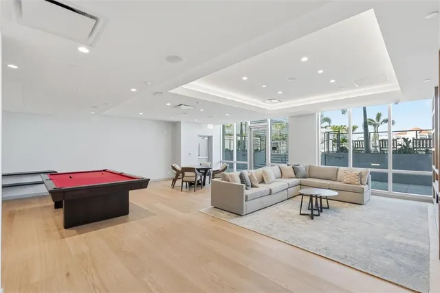 a view of a deck with a table and chairs