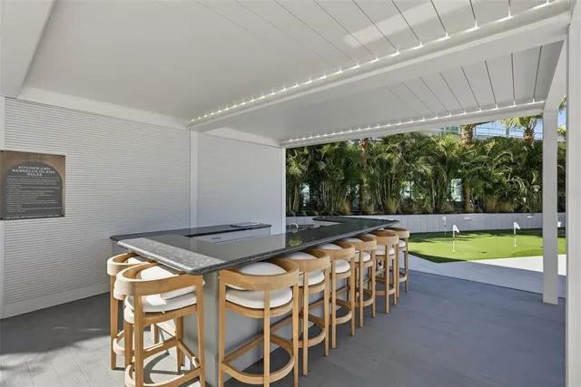 a view of a livingroom with furniture and window