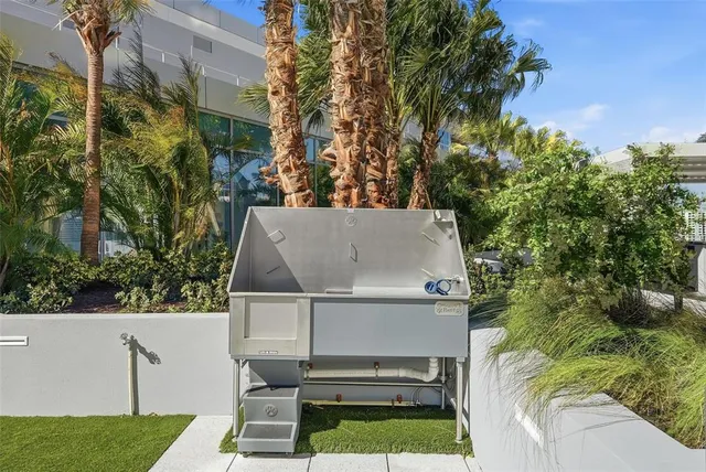 a room that has a bed and a mirror in it