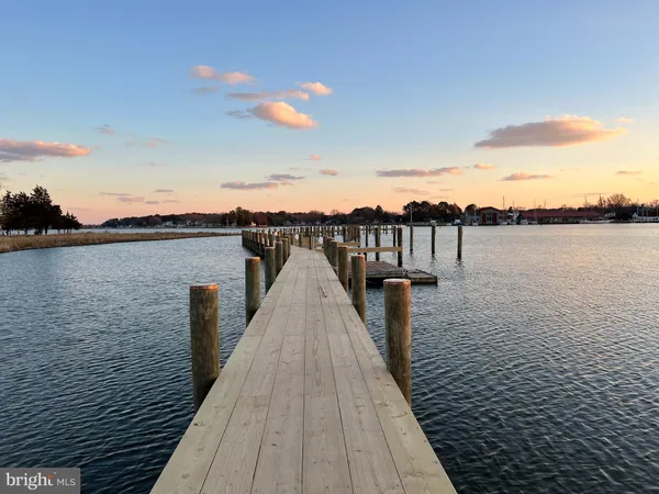 a front view of a house with large windows
