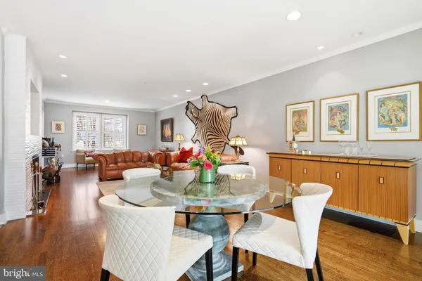 a bathroom with a glass shower door and a sink