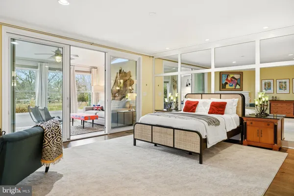 a bathroom with a granite countertop sink mirror and shower