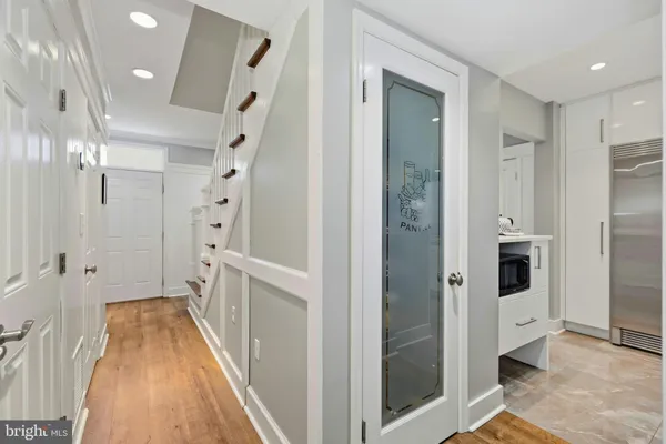 an aerial view of a houses with a lake