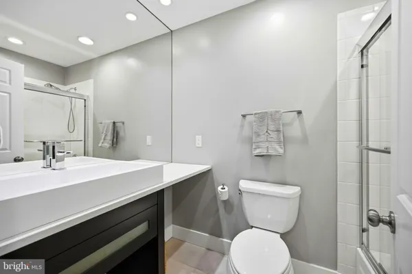 a front view of a house with yard and porch