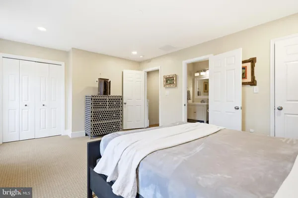 a view of a lake with houses in the back