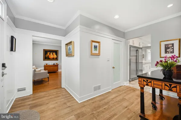 a kitchen with stainless steel appliances kitchen island granite countertop a sink and cabinets