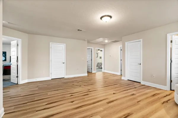 a room with furniture and a flat screen tv