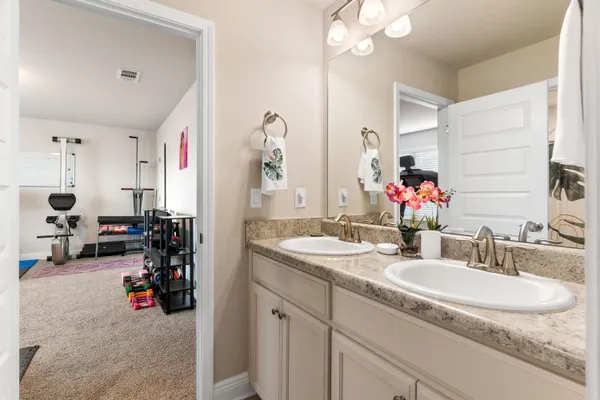 a view of a room with gym equipment