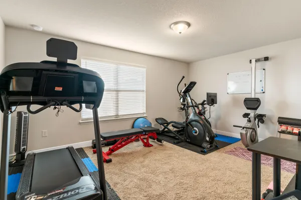 a view of a room with gym equipment