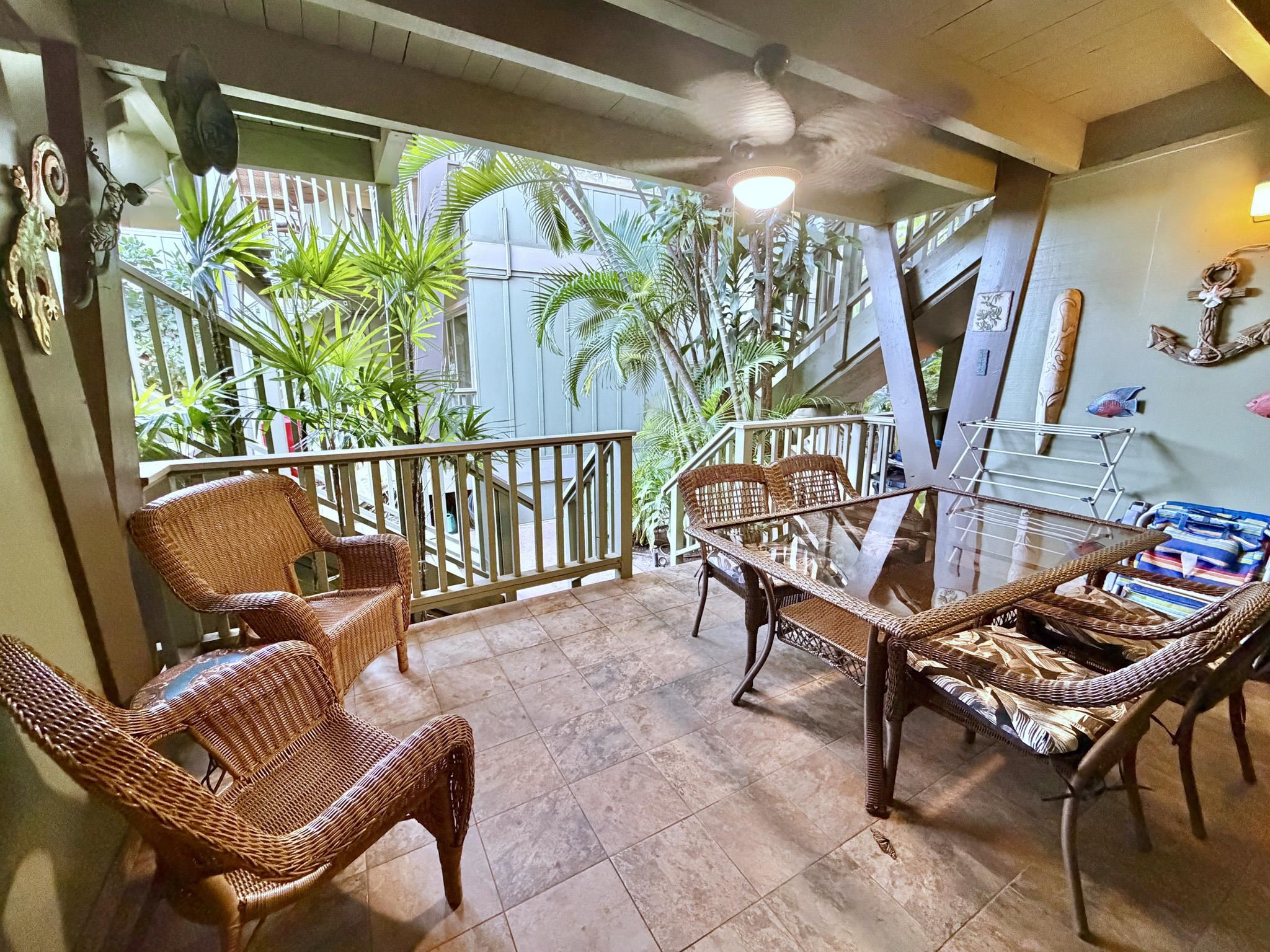 61 North Kihei Road, Unit 18 Kihei, HI 96753 - Photo 4 of 23 a view of a chairs and table in the balcony