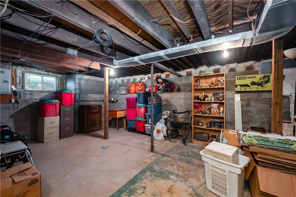 411 Harmony Road Baden, PA 15005 - Photo 20 of 25 a view of a storage room with racks