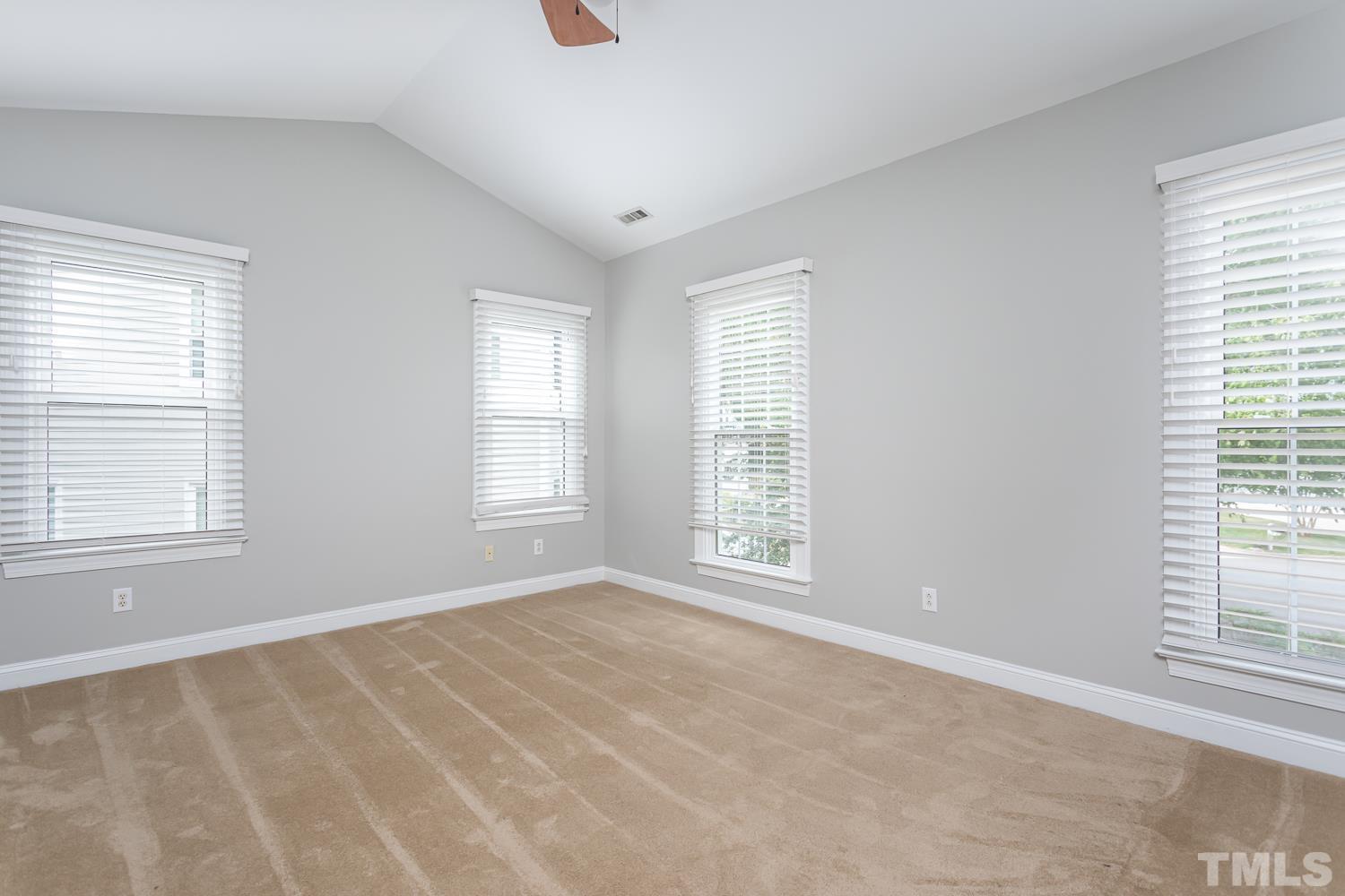 5304 Back Sail Court Raleigh, NC 27613 - Photo 11 of 22 a view of an empty room with a window