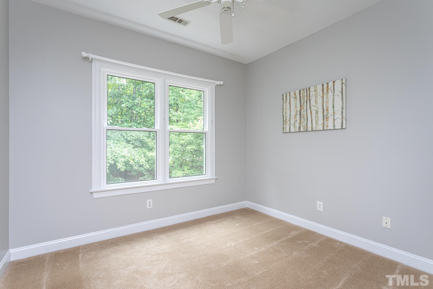 5304 Back Sail Court Raleigh, NC 27613 - Photo 16 of 22 an empty room with a window