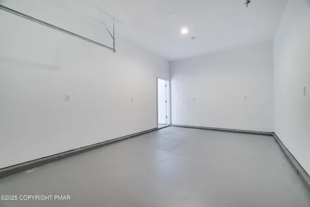 a picture of a bench in front of a window