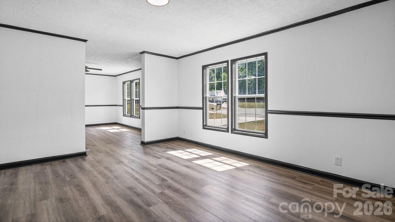 175 Fallsworth Court Salisbury, NC 28147 - Photo 11 of 35 a view of wooden floor and windows in a room