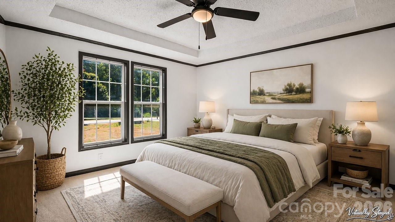 175 Fallsworth Court Salisbury, NC 28147 - Photo 21 of 35 a spacious bedroom with a large bed and a large window