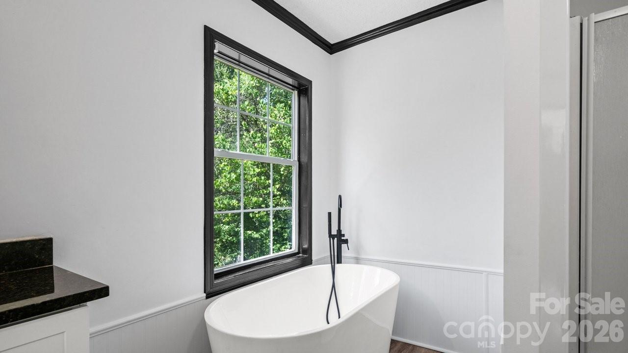 175 Fallsworth Court Salisbury, NC 28147 - Photo 24 of 35 a white bath tub sitting next to a window