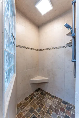 a bed room with furniture and a window