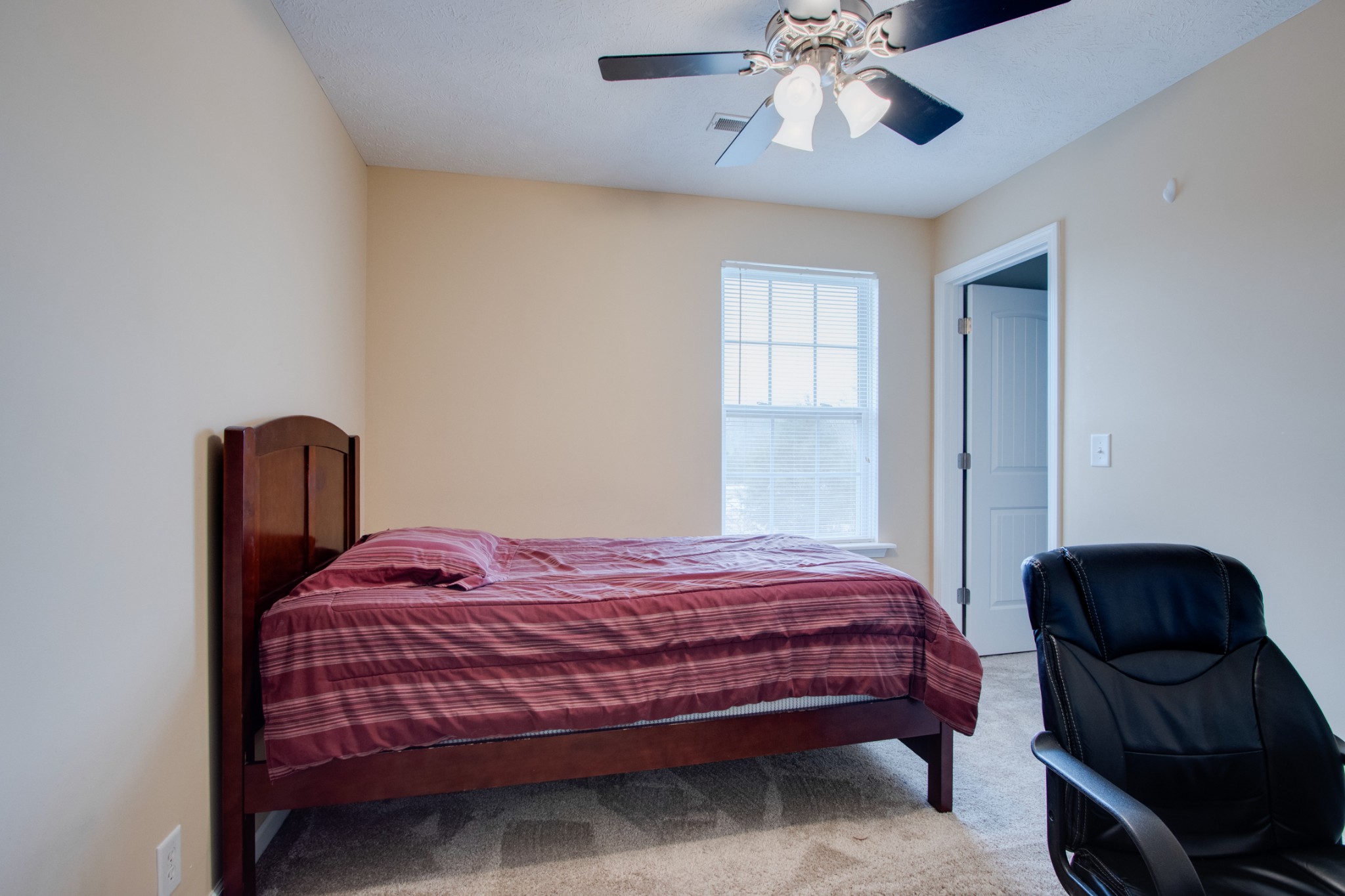 977 Woodall Road Lebanon, TN 37090 - Photo 24 of 32 a bedroom with a bed and dresser