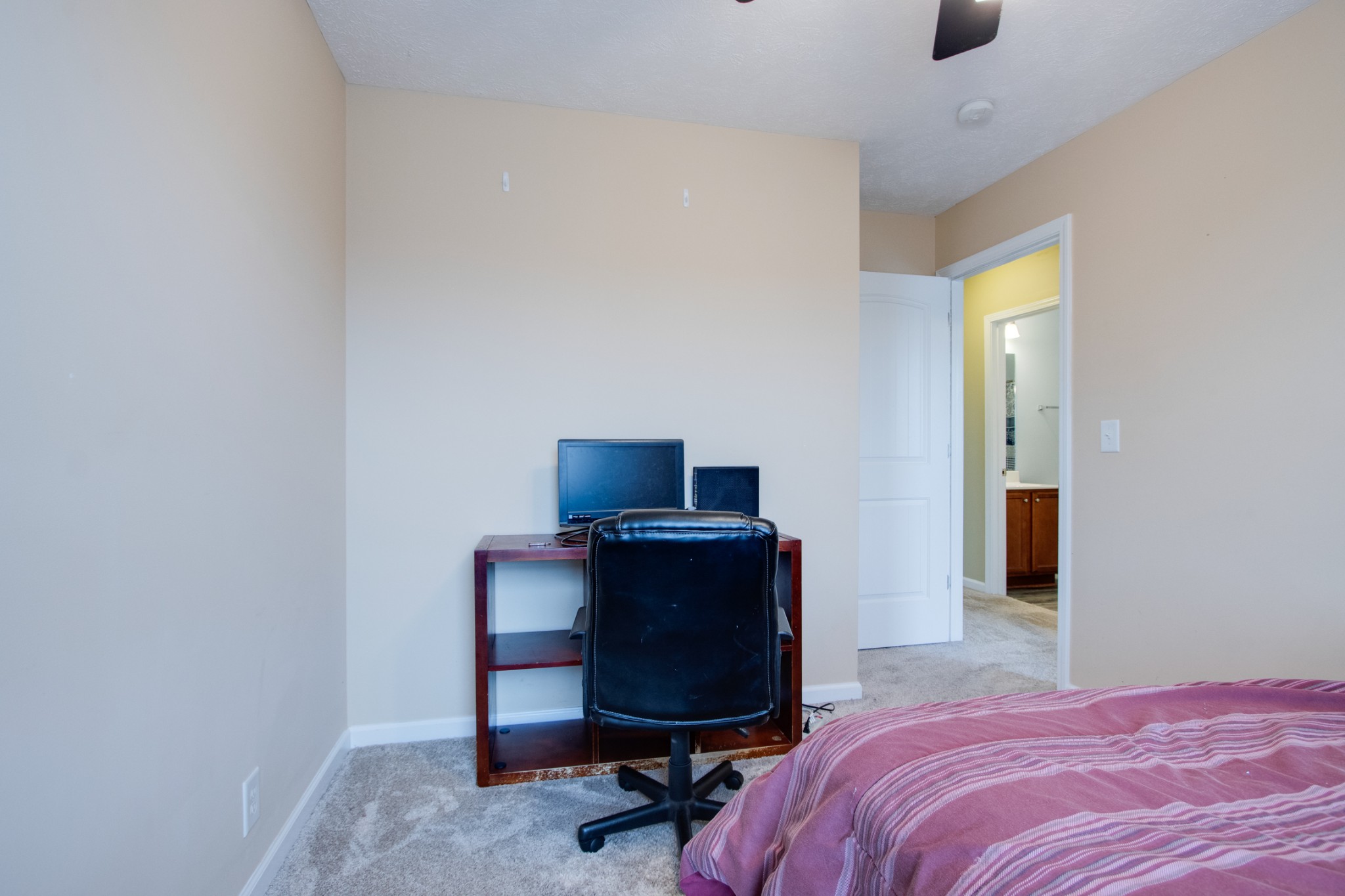 977 Woodall Road Lebanon, TN 37090 - Photo 25 of 32 a bedroom with a bed and chair