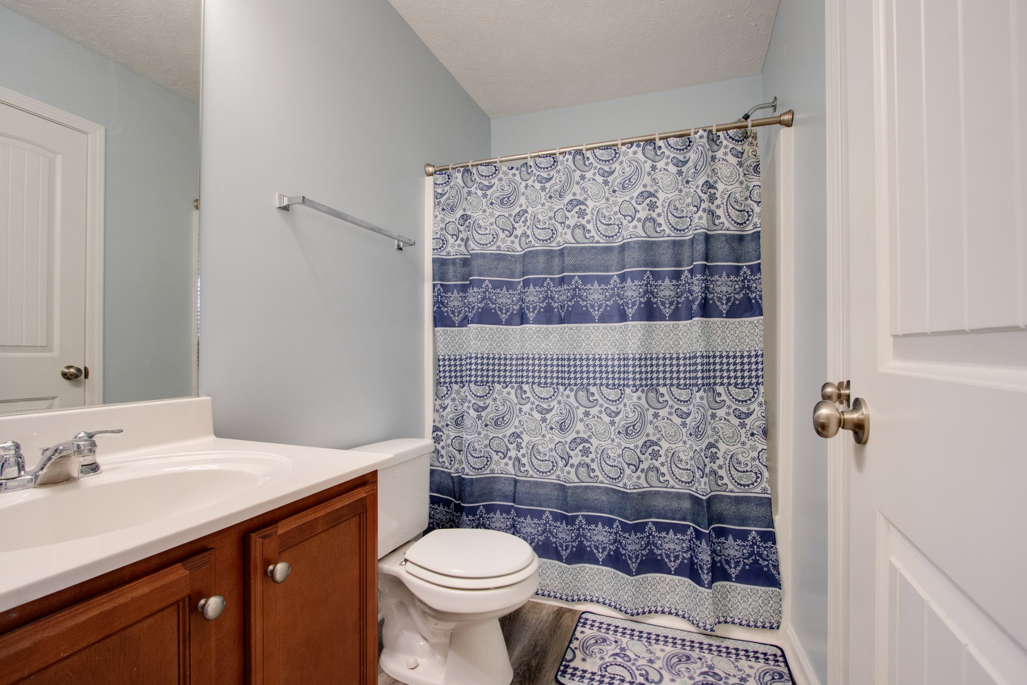 977 Woodall Road Lebanon, TN 37090 - Photo 26 of 32 a bathroom with a sink toilet and shower