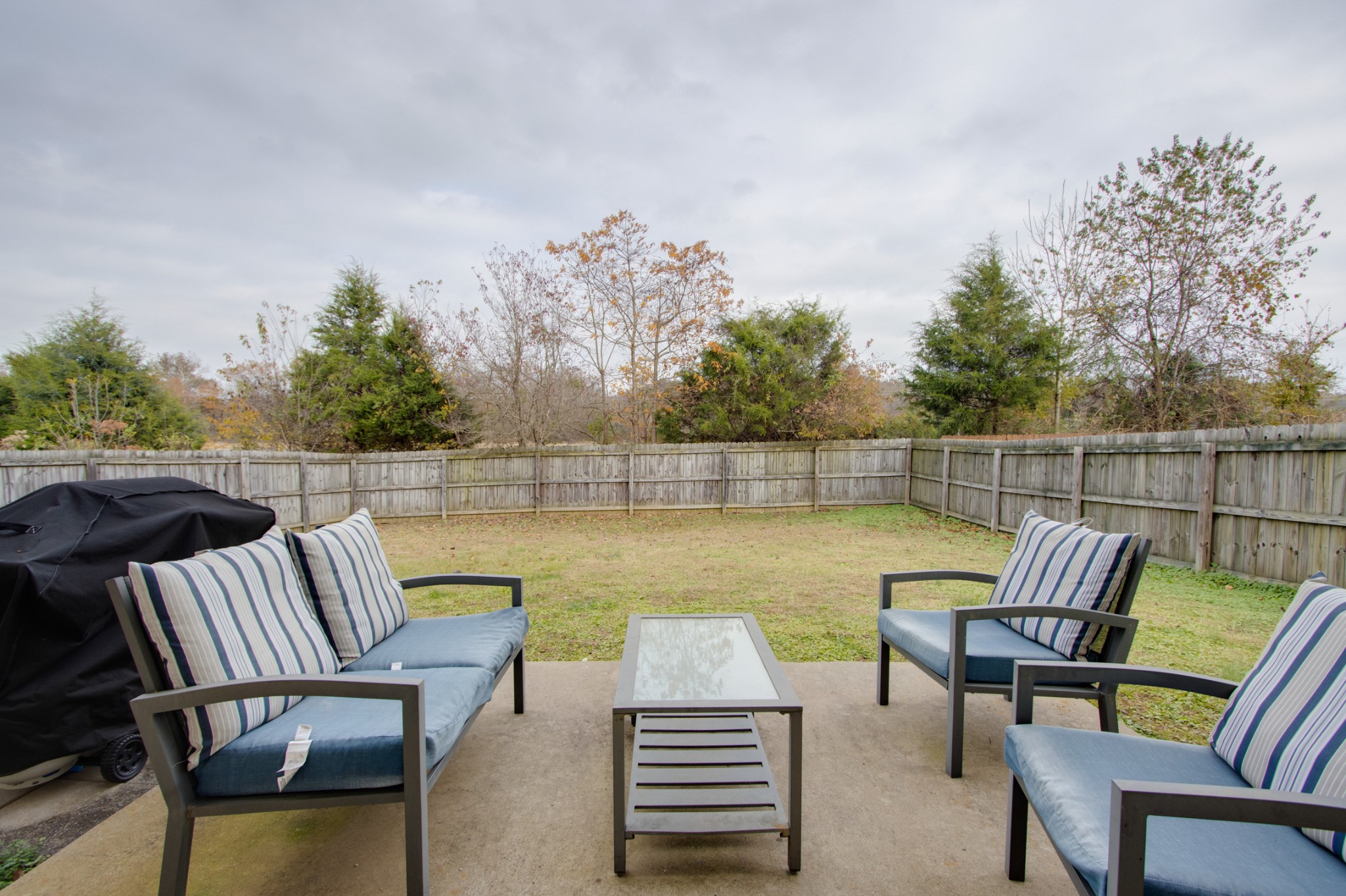 977 Woodall Road Lebanon, TN 37090 - Photo 29 of 32 a view of a roof deck with couches and sky view