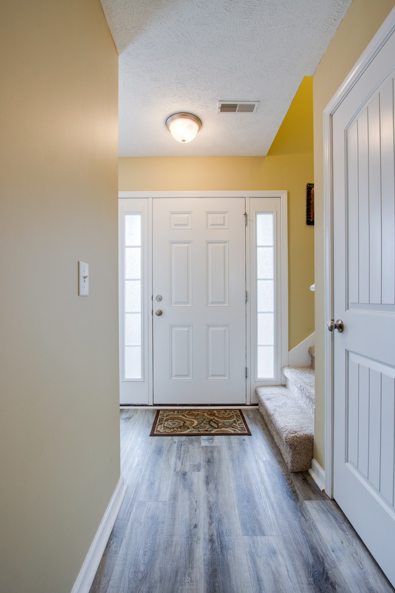 977 Woodall Road Lebanon, TN 37090 - Photo 4 of 32 a view of a room with wooden floor